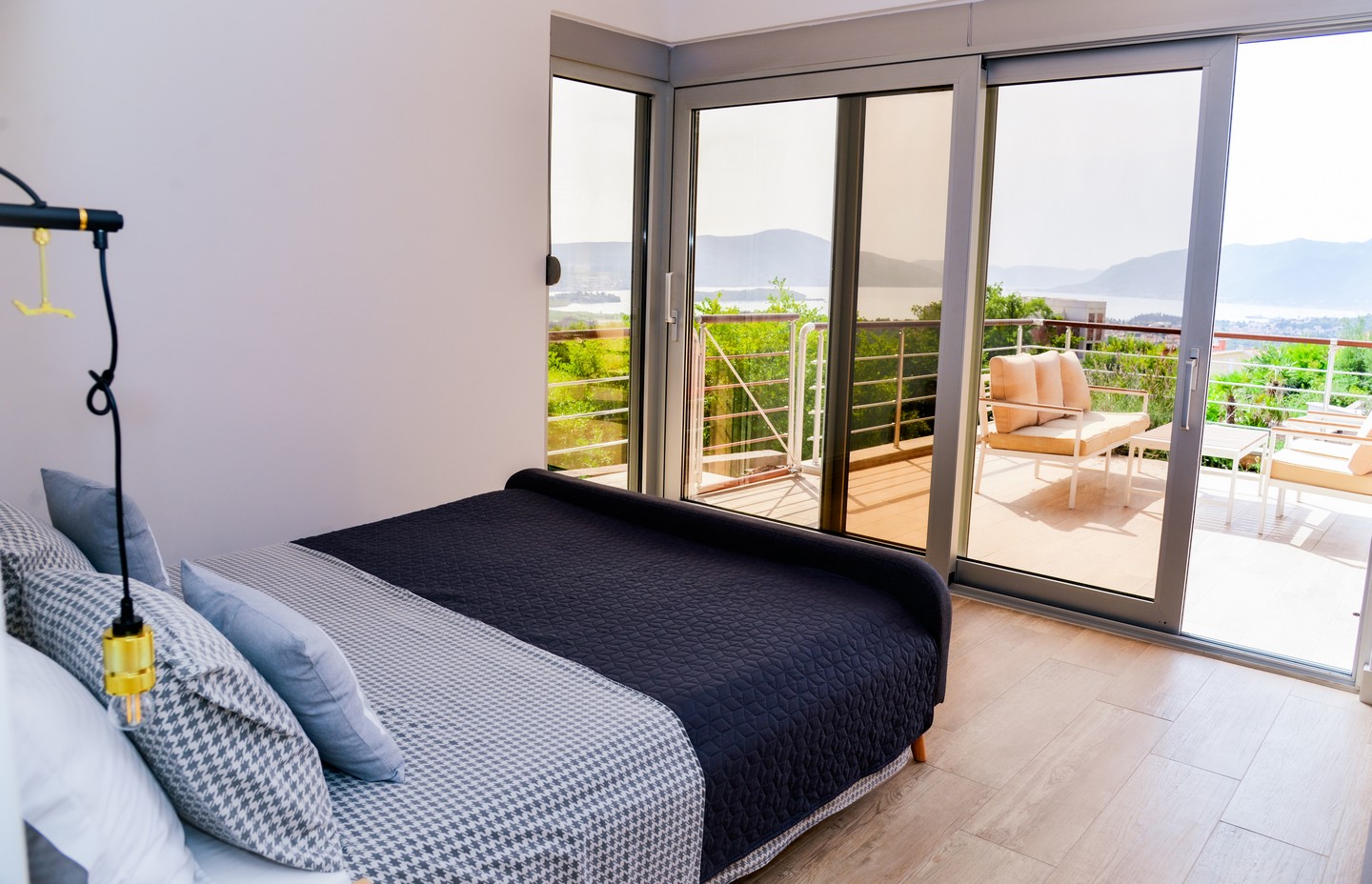 Tivat Heights Residence, Montenegro - Master bedroom and panoramic terrace sea view Tivat Bay